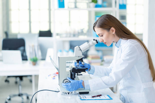 istock Female scientist in laboratory 985169350