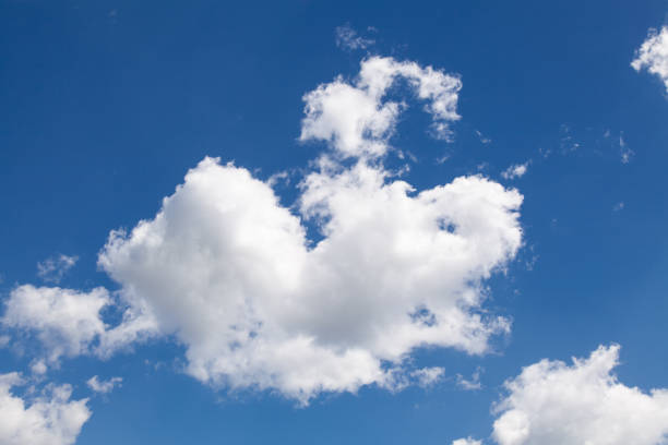 istock Beautiful white clouds over blue sky. Sunny day 985170292