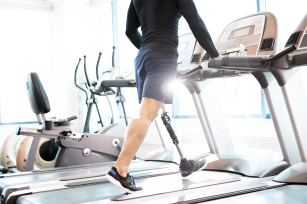 istock Muscular Man Working Out on Treadmill 985170744
