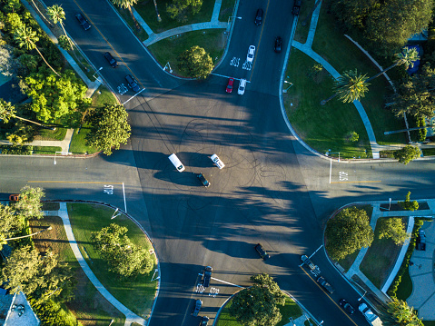 Aerial shot of the famous six way stop intersection in Beverly Hills, California, where Beverly Drive, Canon Drive and Lomitas Avenue meet.