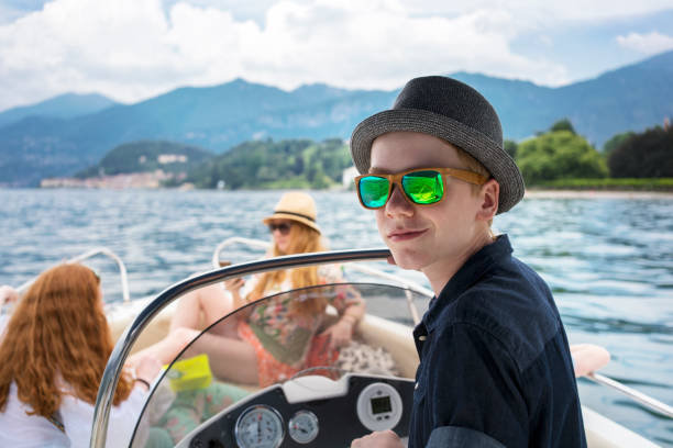 istock Family vacation on a boat sailing on a lake 985188030