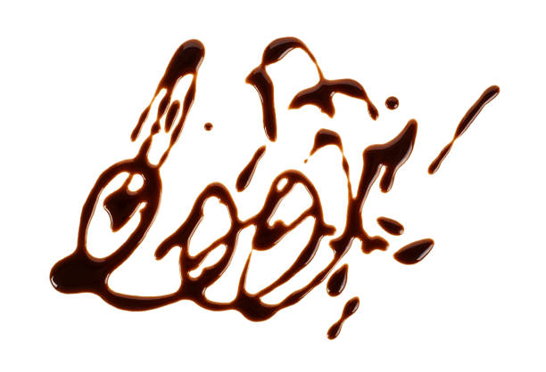 istock Chocolate sauce isolated on a white background 985235456