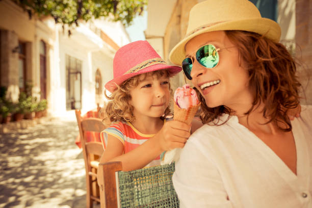 istock Mother and child eating ice-cream 985238146
