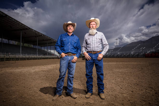 Dramatic portrait style shot taken at a rodeo arena, using artificial light.