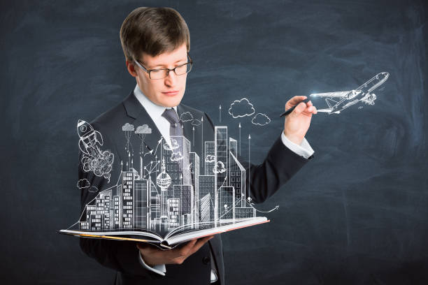 istock Businessman drawing sketch 985262800