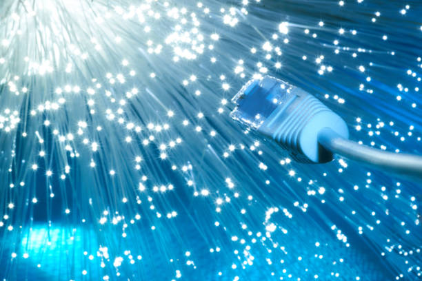 istock Closeup on the end of optical fiber network cable 985307416