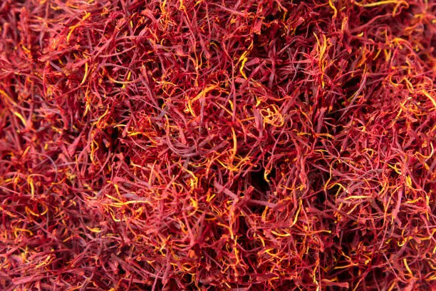 One Ounce of Mancha Quality Spanish Saffron, full frame, from above on white background
