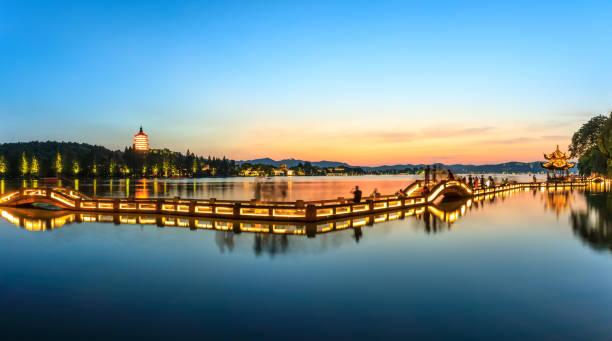 istock Hangzhou West Lake landscape at sunset 985338330