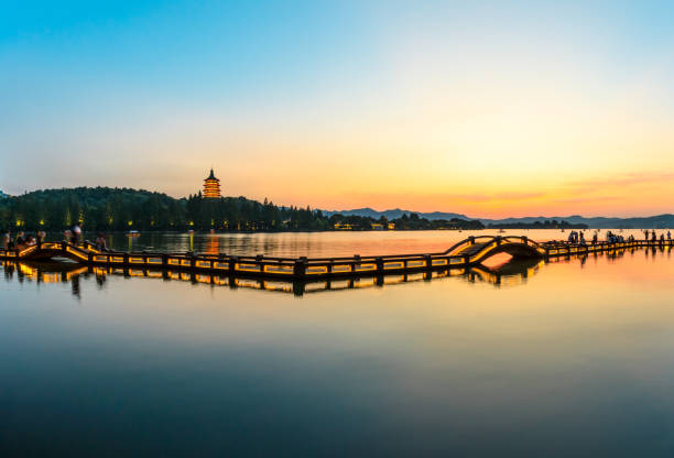 istock Hangzhou West Lake landscape at sunset 985345878