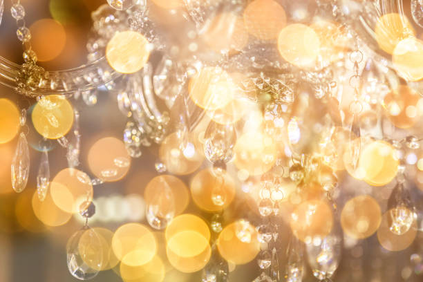 istock Chrystal chandelier close-up. Glamour background with copy space 985346654