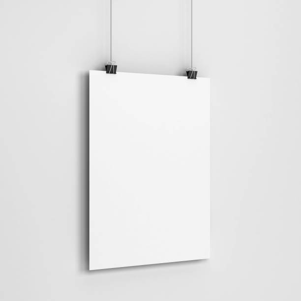 istock Blank poster hanging on a wall mockup 985350446