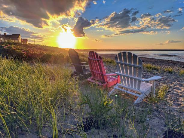 Cape Cod Beach at Sunset Aidirondack Chair's overlooking the sunset cape cod photos stock pictures, royalty-free photos & images