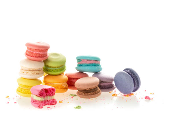 istock Colourful french macarons on white background 985429534