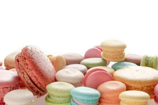 istock Colourful french macarons on white background 985429614