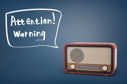 3d rendering of brown retro radio set near a speech bubble with words Attention and Warning inside of it. Emergency notification. Information media. Important news.