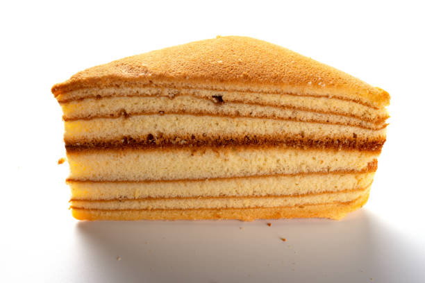 istock homemade sandwich shape sponge cake on white 985464888