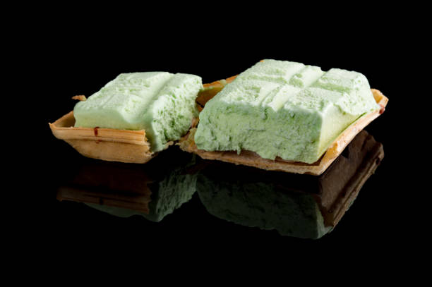 istock studio shoot of ice cream block on black with reflection 985468142