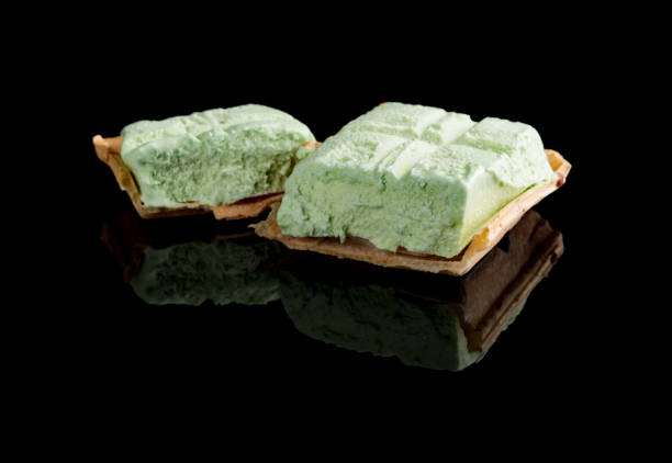 istock studio shoot of ice cream block on black with reflection 985480820
