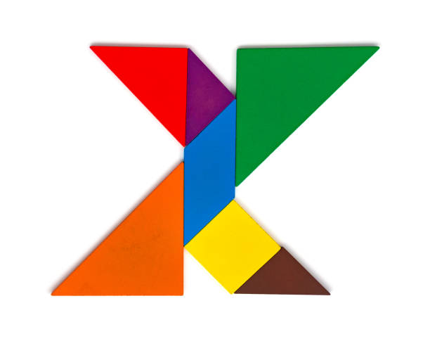 istock tangram shaped like a letter X on white background 985488092