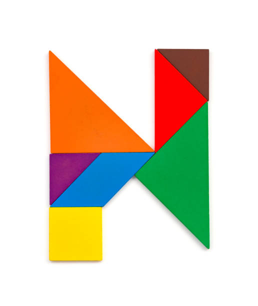 istock tangram shaped like a letter N on white background 985491860