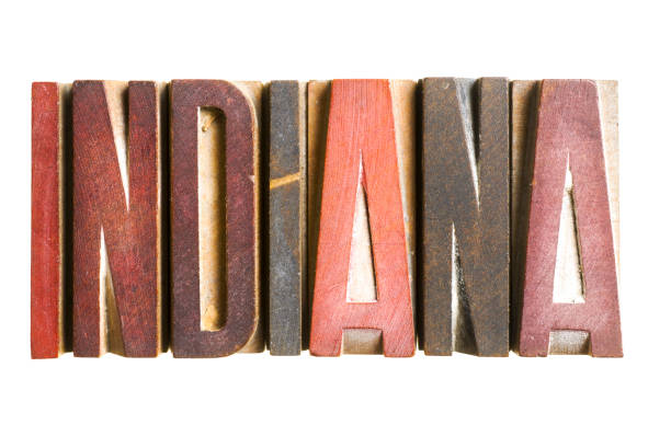 Close up color image depicting a red metal vintage sign with the words Keep Calm and Carry On. Lots of room for copy space.