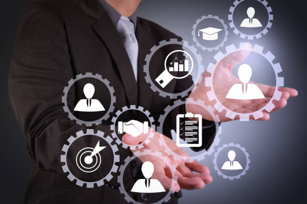 istock business man with an open hand as showing something 985527986
