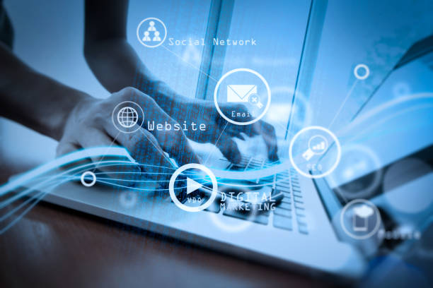 istock Waves of blue light and businessman using on smartphone as concept 985548434