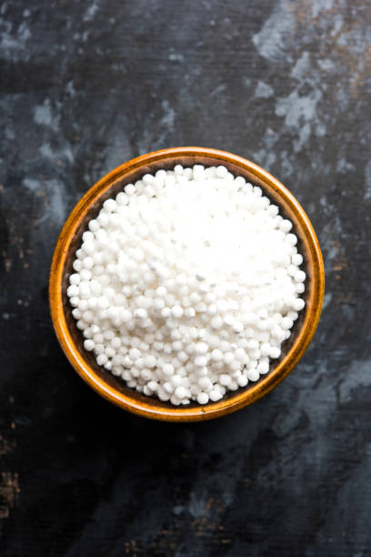 istock Sago or Sabudana served in a bowl over moody background. selective focus 985550938