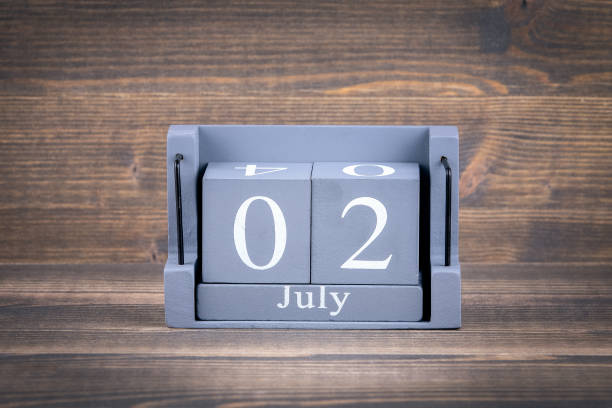 istock 2 july wooden, square calendar 985577028