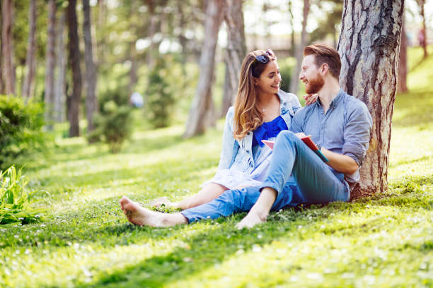 istock Beautiful couple studying together for exams 985585966