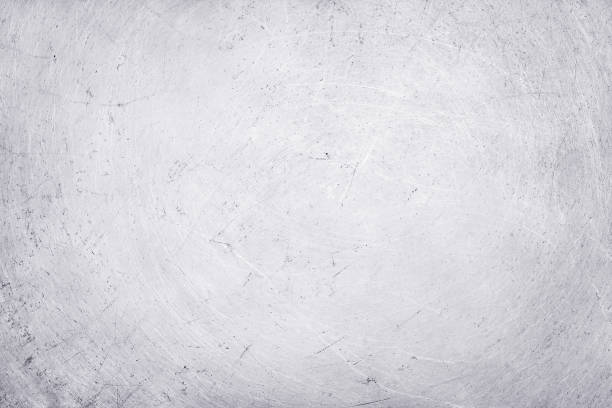 istock aluminium texture background, scratches on stainless steel. 985595912