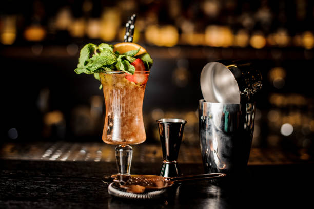 istock Fresh summer cocktail with mint, orange and strawberries 985596152
