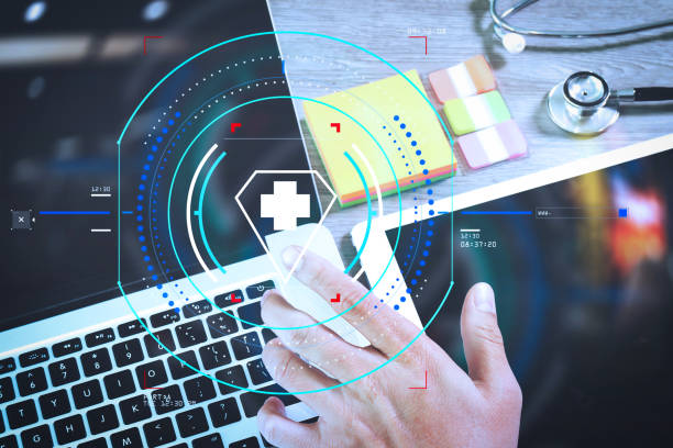 istock Medical network technology concept. Doctor hand working with stethoscope and laptop computer digital tablet with medical chart interface. View from top and close up photo. Double exposure effects, Minimalism 985601798