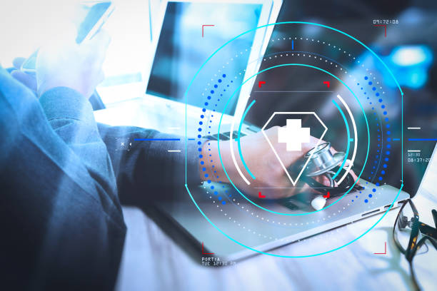 istock Medicine doctor hand working with modern digital tablet and laptop computer with computer interface as medical network concept 985609066