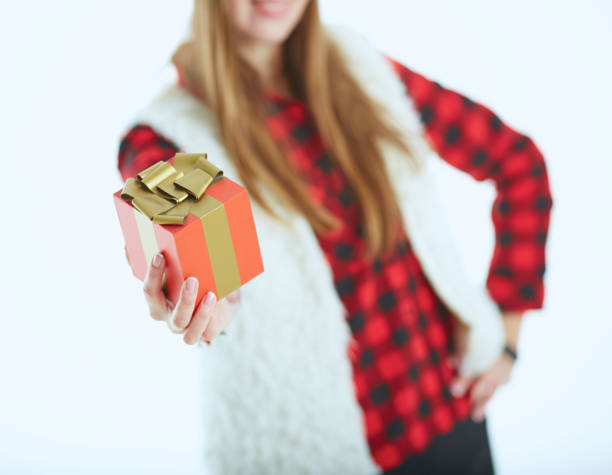 istock Portrait happy woman with gift box in hands. 985617832