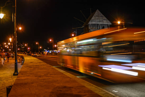 istock Bus Travelling down the Street 985635304