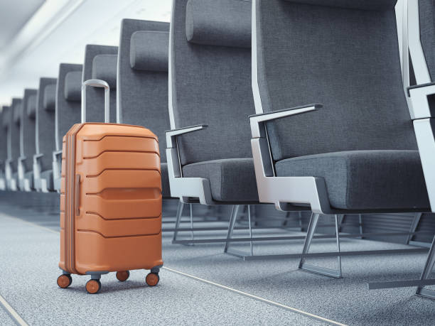 istock Travel suitcase at the airplane. 3d rendering 985651760