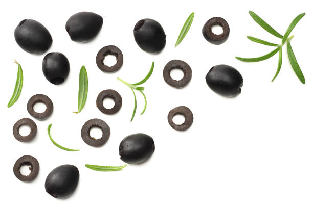 istock Marinated black olives with rosemary isolated on white background. top view 985663254