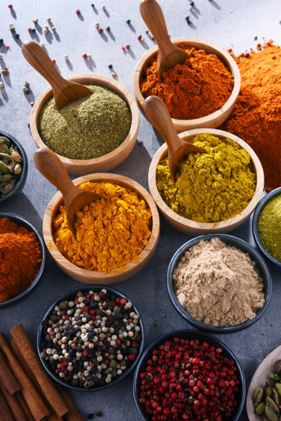 istock Variety of spices on kitchen table 985664596