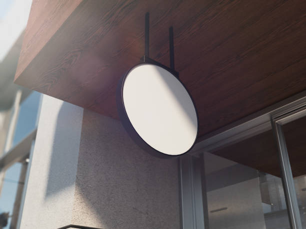 istock White blank round signboard on the wooden ceiling, 3d rendering. 985672208