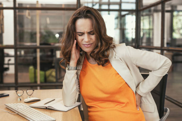 istock Unhappy pregnant CEO feeling tension 985677832