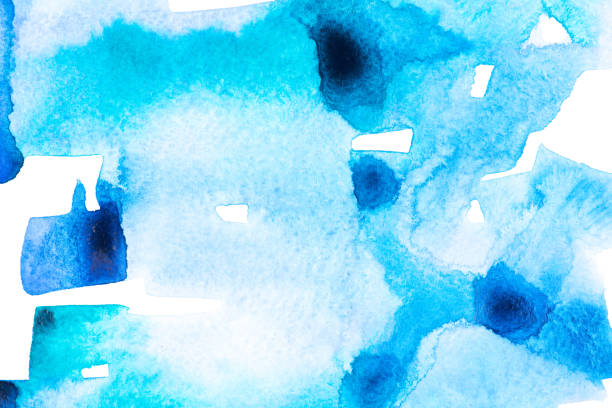 istock Abstract painting with dark and light blue paint blots on white 985678810