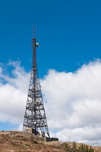 communication tower for 5G network telephone cellsite with dusk sky