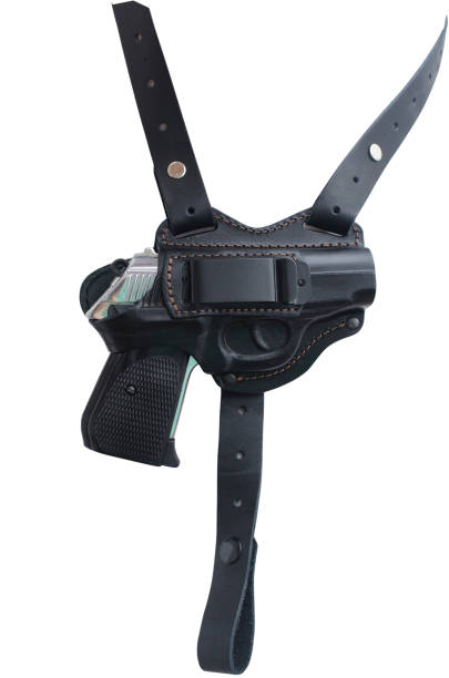 istock Holster with a gun isolated on white 985752010