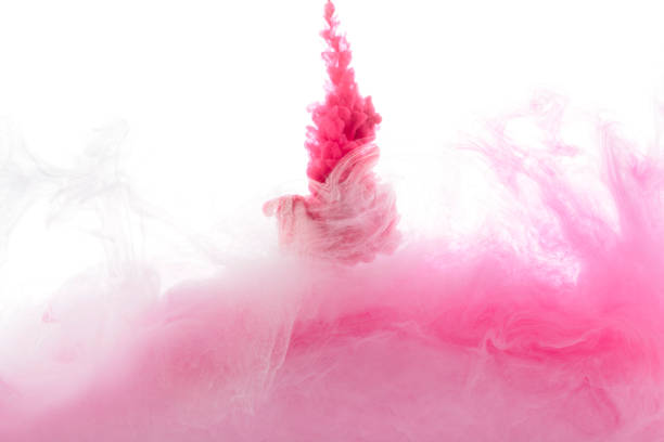 istock close-up view of pink paint splashes isolated on white 985756812