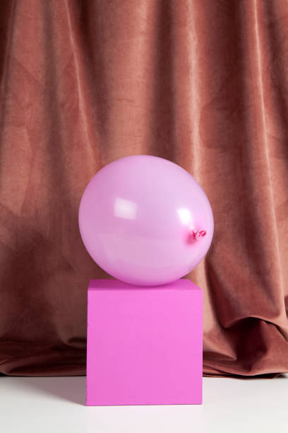 istock colourful velvet pink balloon cube 985757364