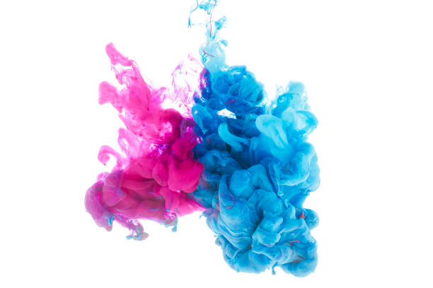 istock mixing of blue and pink paint splashes isolated on white 985759018