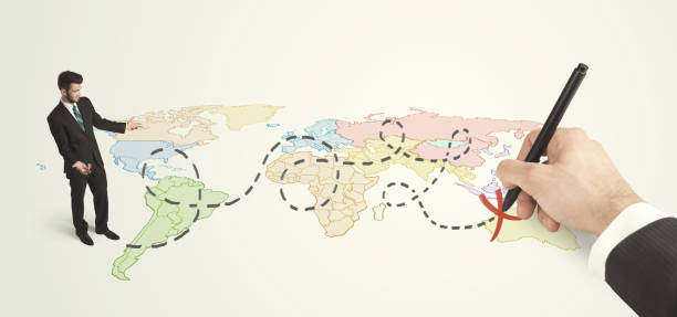 istock Businessman looking at map and route drawn by hand 985759060