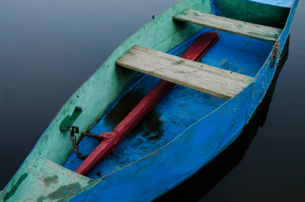 istock old iron boat on the water 985762176