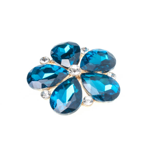 istock brooch flower with blue stones isolated on white 985762556